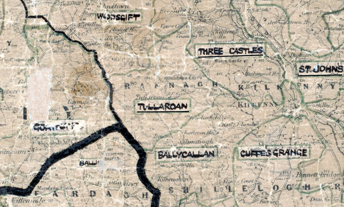 A scanned, worn historical map from the 1940s of the rural electrification area around Tullaroan. A hand‑drawn boundary outlines the region, including Woodsgift, Three Castles, St. Johns, Ballycallan, and Cuffesgrange.