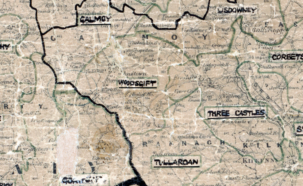 A scanned, worn historical map from the 1940s of the rural electrification area around Woodsgift. A hand‑drawn boundary outlines the region, including Galmoy, Lisdowney, Three Castles, and Tullaroan.