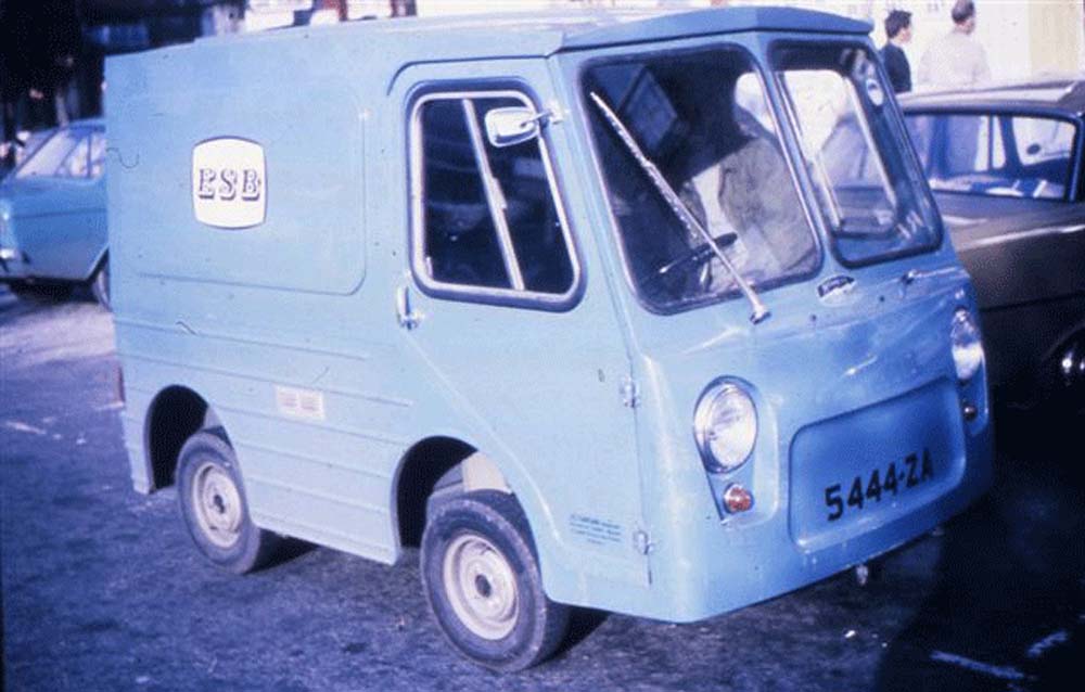 Colour photograph of an ESB service van, viewed from the front left side, with other vehicles visible in the background.